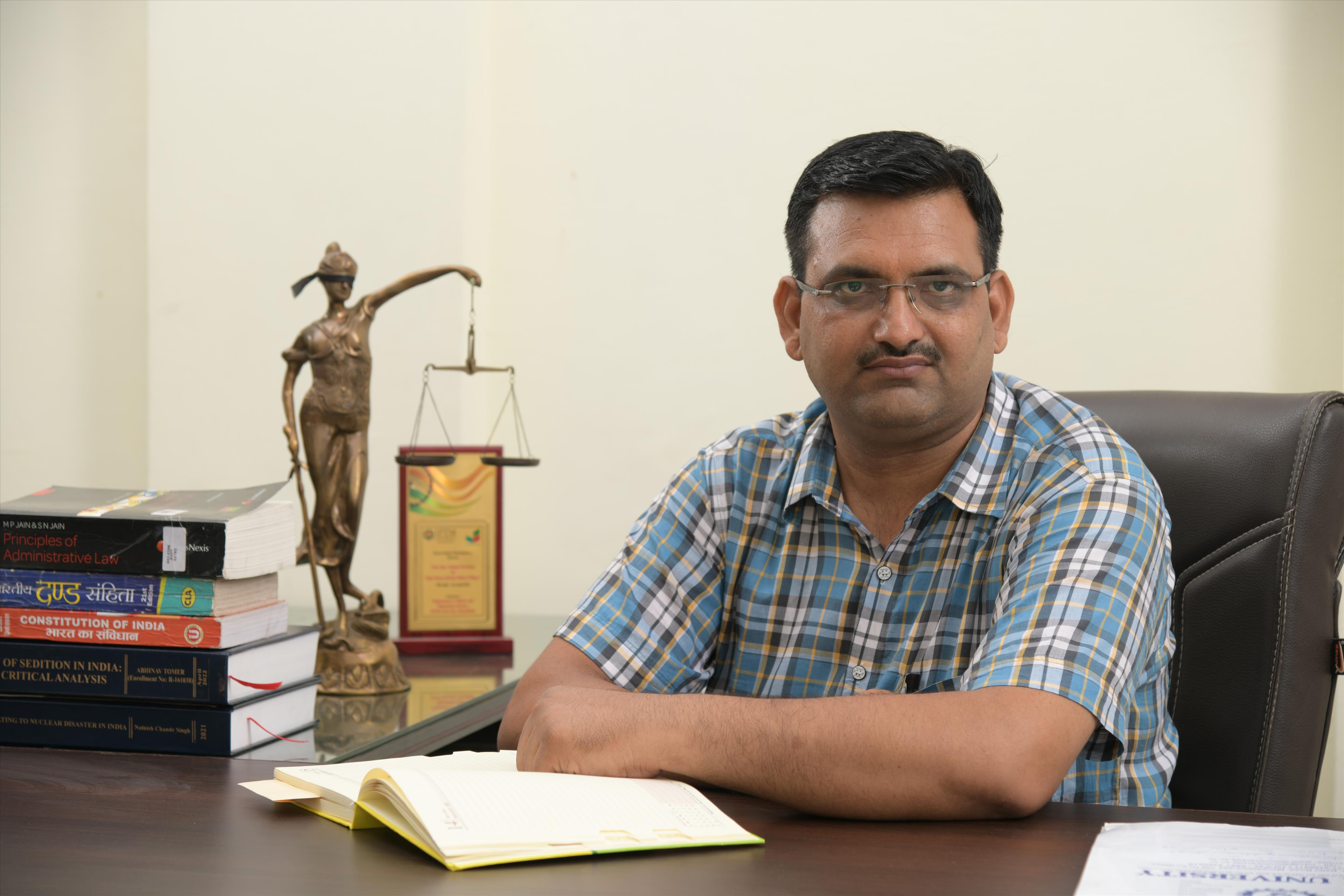 Director School of Law